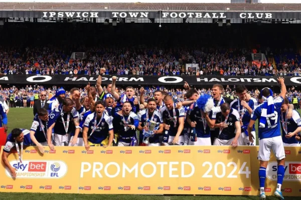 IPSWICH TOWN SEAL PROMOTION TO PREMIER LEAGUE WITH 2-0 WIN OVER HUDDERSFILED AFTER 22 YEARS